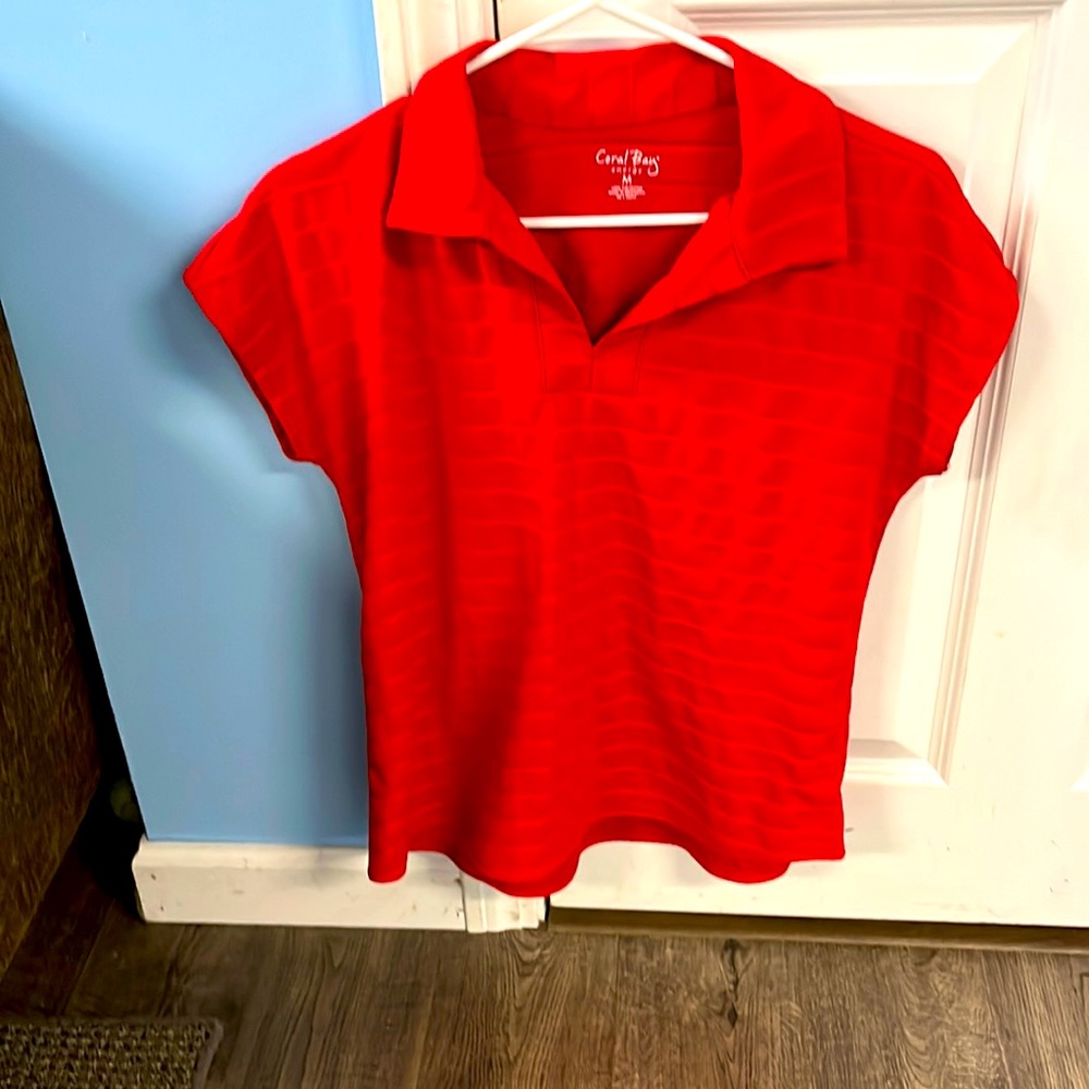 Coral Bay energy- med vibrant red shirt with collar. Great color & comfortable